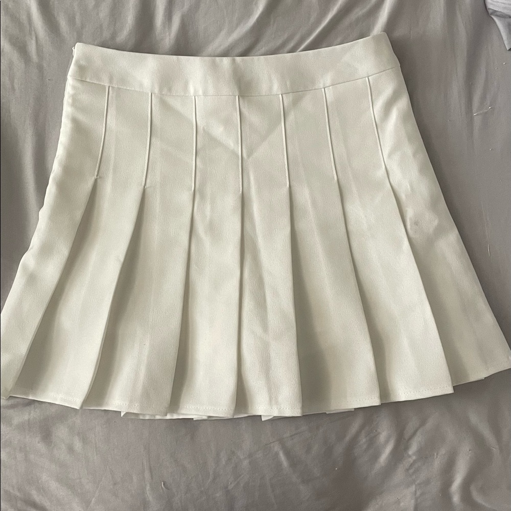 white pleated skater skirt